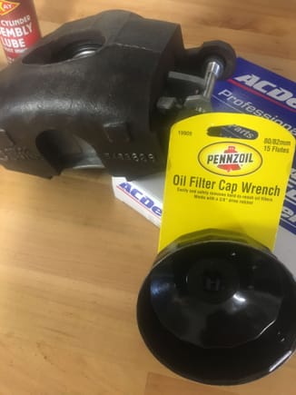 Ended up rebuilding original calipers.  Wrestled with the dern dust seals a couple days until i finally discovered this oil filter tool.   Had to very lightly grind the outer circumference and then it worked perfect as dust seal driver. 