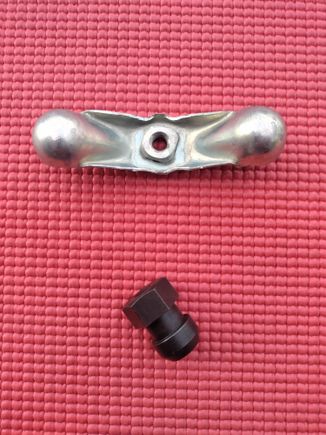 Top - Spare tire wing nut. New aftermarket.
$10.
Bottom - Spare tire hex nut for SS wheels. New aftermarket.
$20