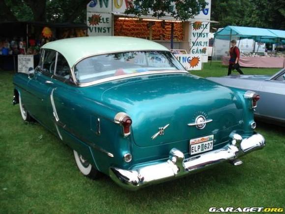 The 1953 Super 88 Holiday Coupe my dad restored in the 90-s, original brown over white, California car. Power windows, power seat and more..