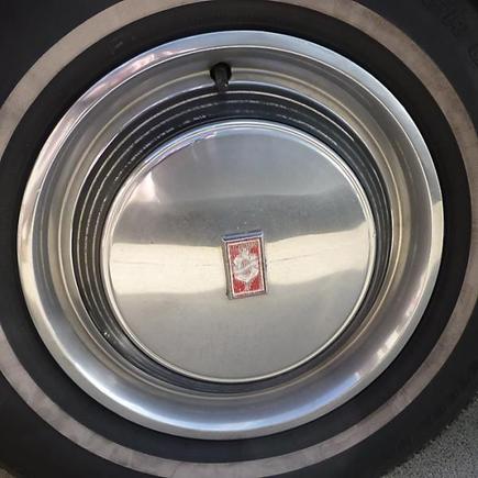 Please identify this mystery wheel cover! It's a 17-incher that fits my '89 Custom Cruiser (V8 RWD)...