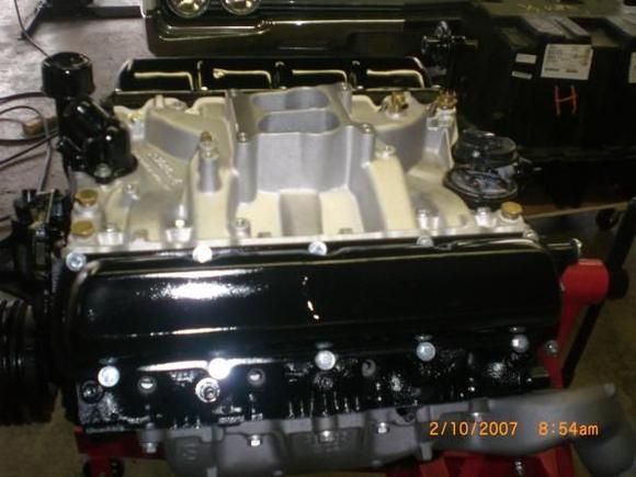 The 425 pulled out, added intake manifold, dual exhaust manifold and painted the head covers black and