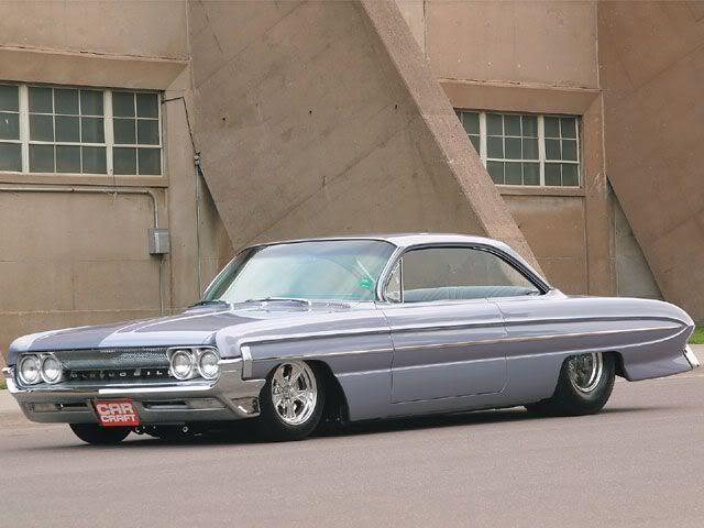 August 05 2016: Beautiful 1961 Chevy Impala with Candy Brandywine