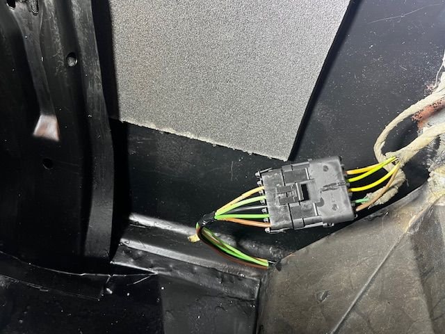Made connection with tail light harness using a new connector