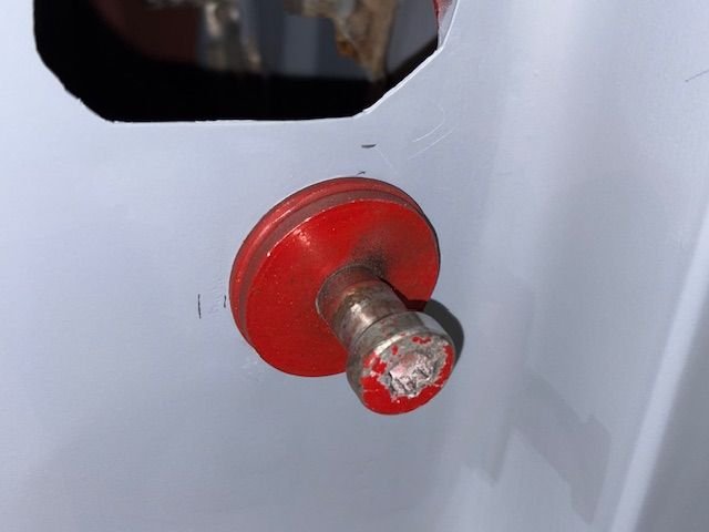 Latch pin temporarily installed.  This could be left off the car until later.  Just get the door swinging first.