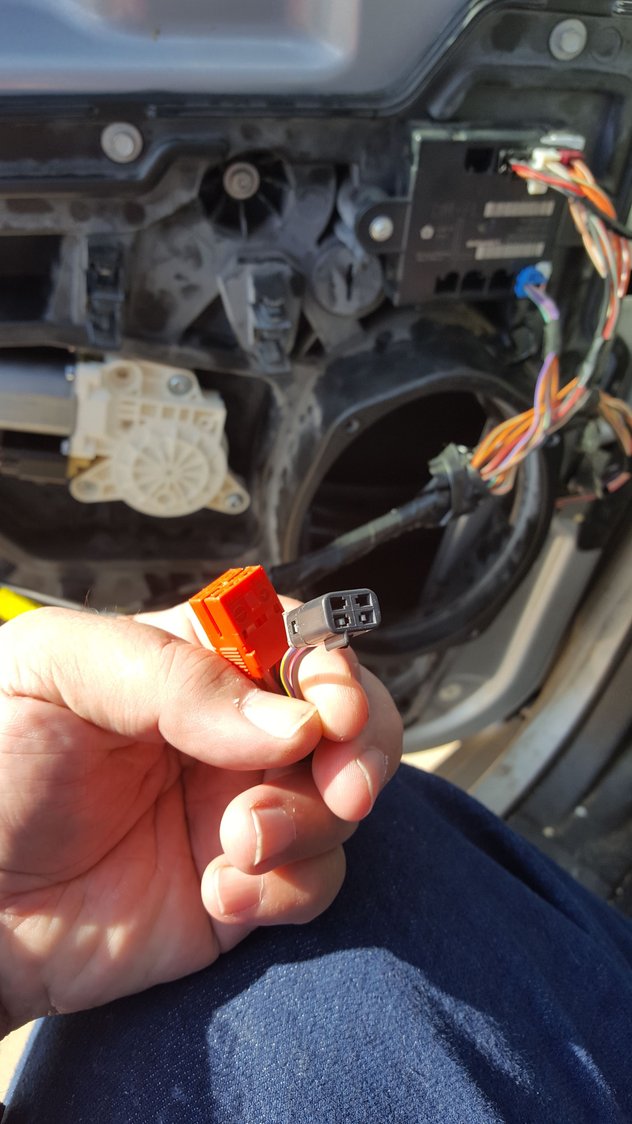 Dodge Caravan drivers door panel reattach.