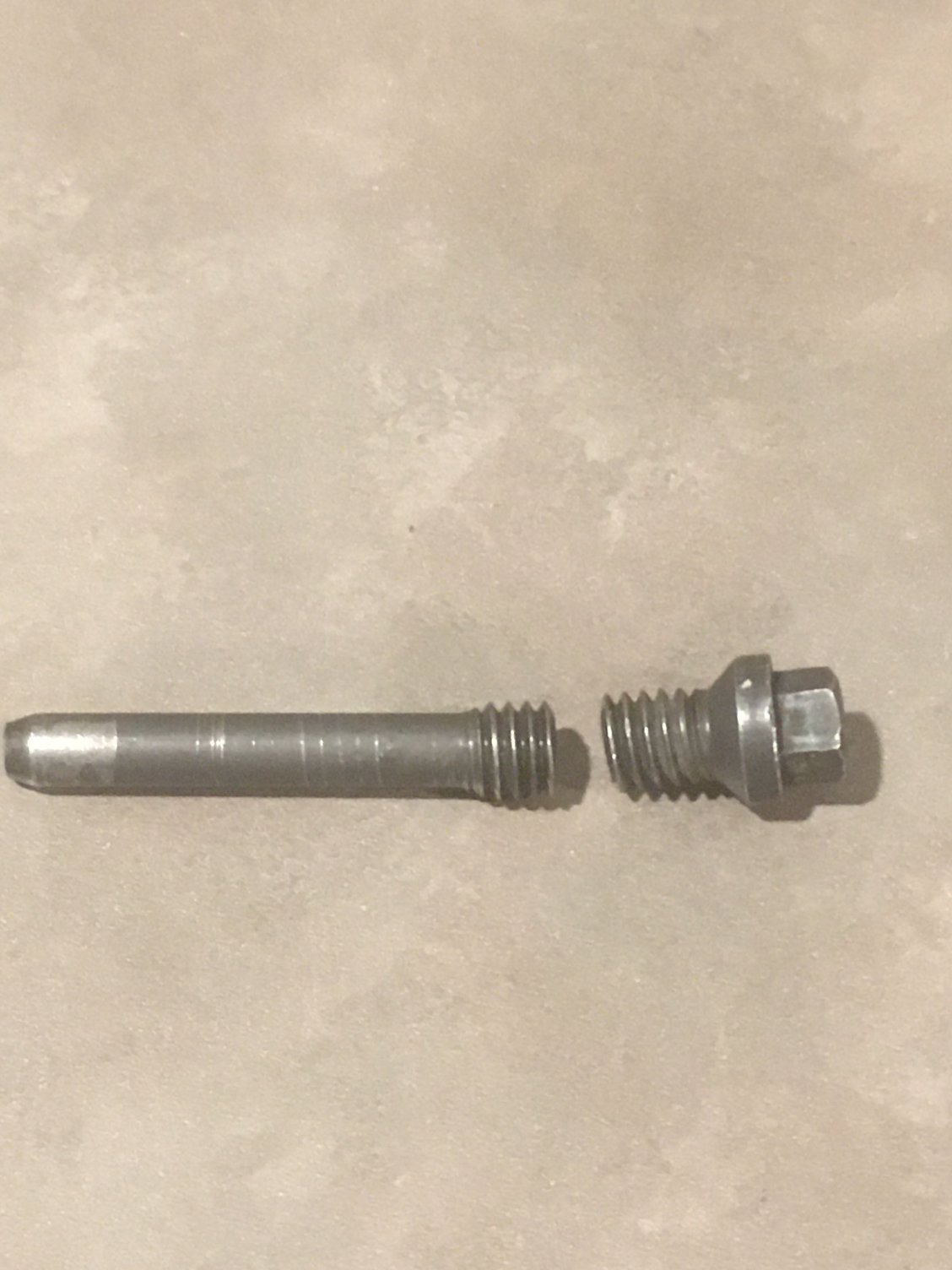 carrier pin retaining bolt