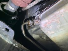 Oil/fluid leaking? You can see evidence of dripping below. 