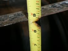Measuring oil pan depth to set the pickup tube. 8.75" deep.