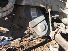 No cover on this side of front wheel well by the transmission