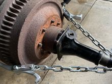 Don’t know if this will help anyone, has a stubborn, rusted drum.  Using a piece of chain, a car jack, and the jaws from an auto-zone rental 7 ton puller the job went smooth.   