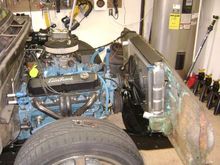 Radiator and support are back in. I also have to mount the overflow tank and the horns. 