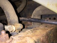 It's the fat 90 degree hose on far right that heads up to engine compartment......(btw, please ignore the crud and rust I'm gonna get to that.....)