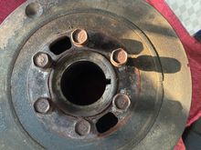 Divot in the top left, as well as two semi-rectangular holes towards the middle I'd like to know about.