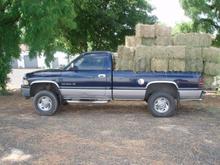 newer picture with 2000 lbs of hay...barely squatting, thanks add-a-leaf