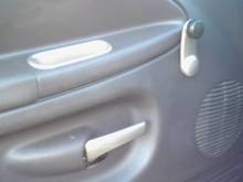 Painted door pieces with a stainless steel coating.