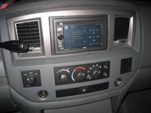 new radio and dash. swapped out from the factory non-NAV radio and got rid of that crap wood grain