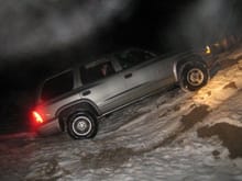 Testing the 4LO on a snow covered hill..  what I learned..  get some lift so the trailer hitch doesn't dig into the ground