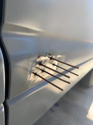 Back at the body work today.  My painter maestro let me borrow his stud welder, simple harbor freight one, but is doing the job.