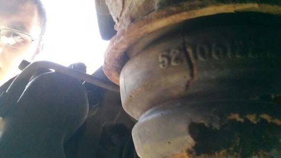 Here is the picture of the bushing from the backside. You can see it is torn bad. It is torn the same way on both sides.