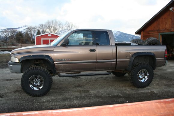 2000 Dodge Ram 1500 Quad/Extended cab with fender flares, nerf bars, spray in bed liner, rear tool box. 5" Lift Kit Zone Off-road #D45 With Upgrades, Moto Metal Wheel Chrome 17X10  -24 OFFSET rims, COOPER DISCOVERER - 37 X 12.50 X 17