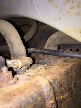 It's the fat 90 degree hose on far right that heads up to engine compartment......(btw, please ignore the crud and rust I'm gonna get to that.....)
