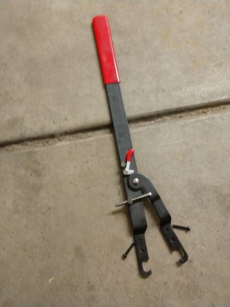 Here is rental tool with couple of machine screws I found in garage