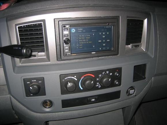 new radio and dash. swapped out from the factory non-NAV radio and got rid of that crap wood grain