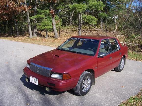 Front corner, lids, fogs, grille, working scoop.
