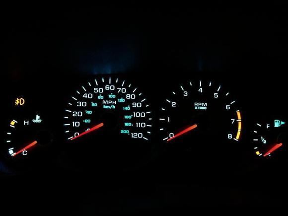 Custom cluster lights. 6 white 20SMD T10 bulbs for the primary gauges, switched the fog bulb out with the low gas bulb. I'm going to put 20SMD bulbs in the turn signal and high beam as well.