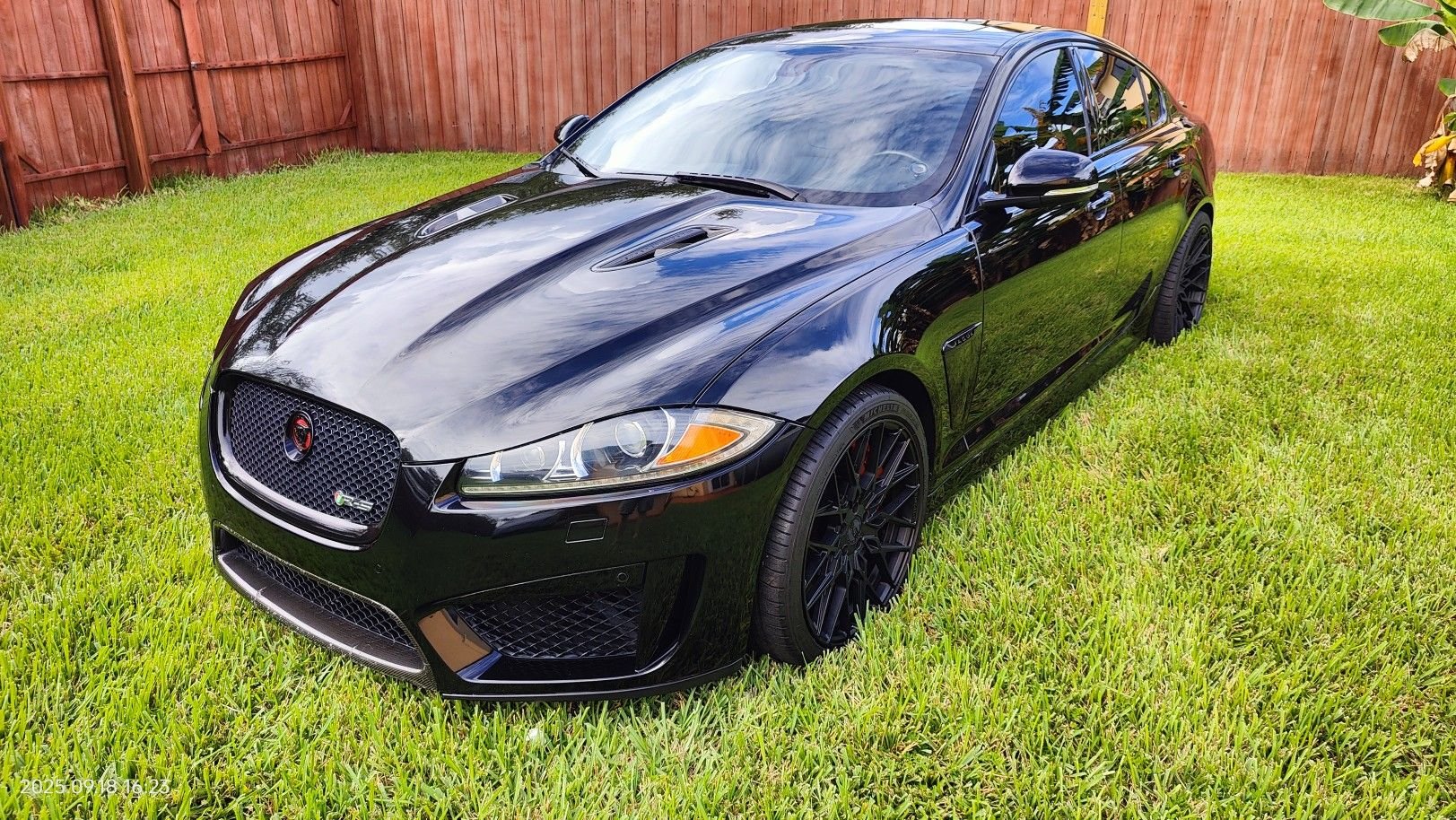 2015 Jaguar XFR-S At my house, after shedding itself of all the crap from Texas.
