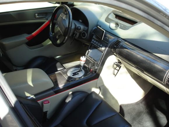 Interior carbon fiber updates: Steering wheel, console, dash.