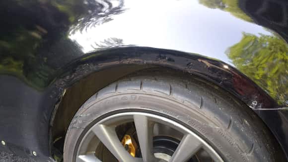 Driver side wheel well rust pre-"repair"