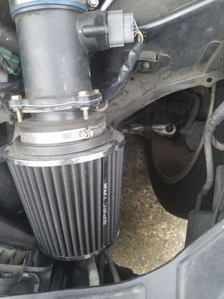 The plastic fender got ripped off when i took it offroad, so my RAM intake is now actually a cold air intake