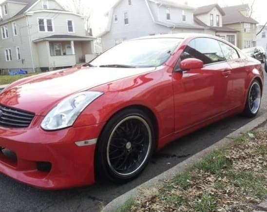 Painted red Trunk debadged new from bumper new headlights new clear corners and rear window visor