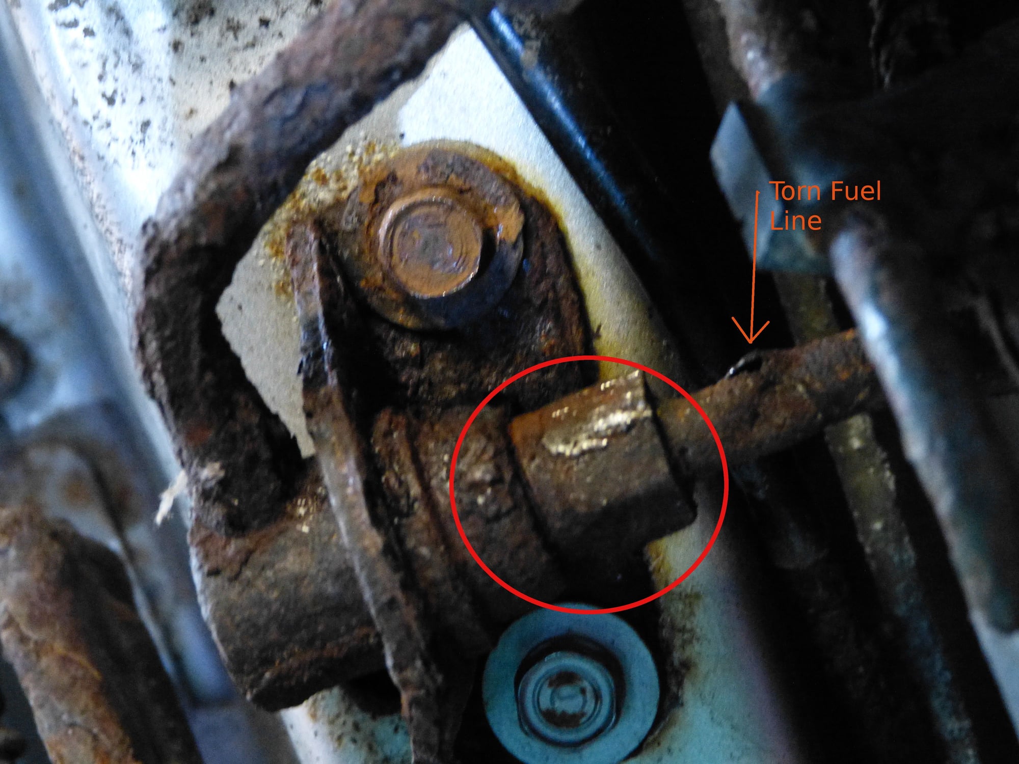 Broke gas tank strap bolt hole.. Suggestions?