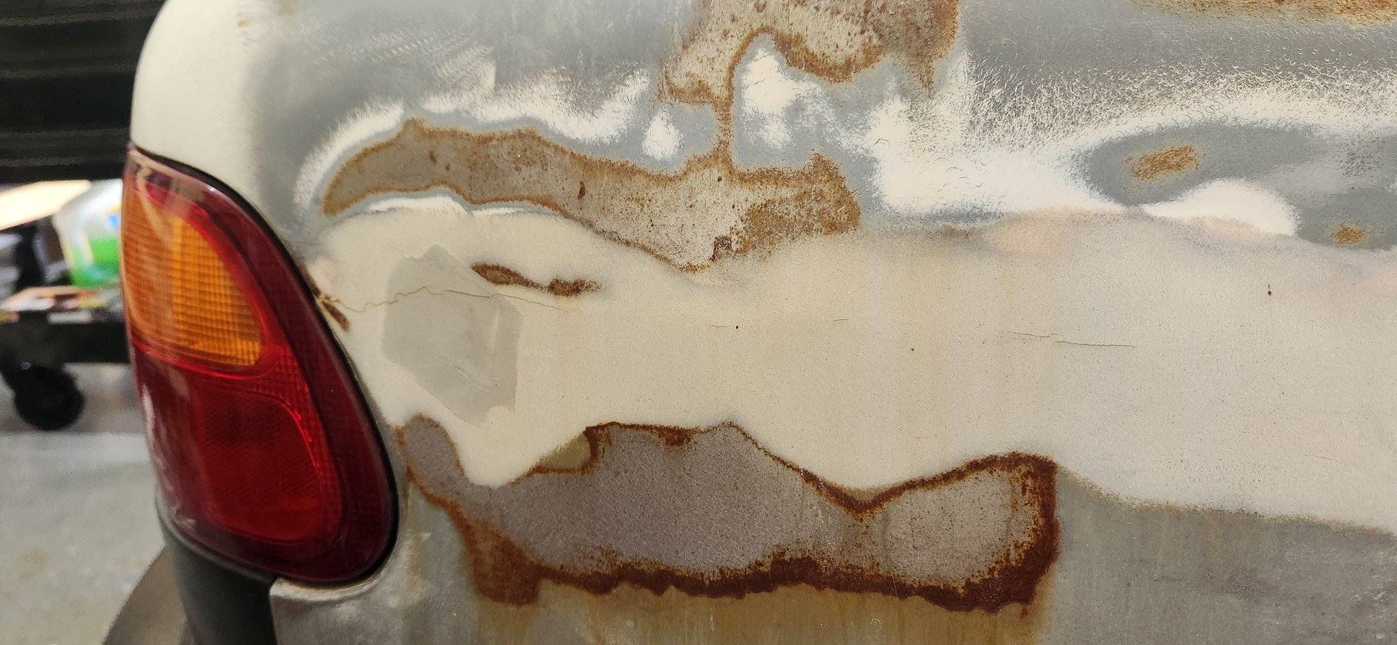 Small crack in bondo on rear passenger side. Can I bondo back over it?