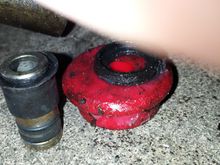 this is the entire old bushing next to 1 side of the new bushing
