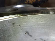 the speck you see there is my concern... it's a "pit" of rust.