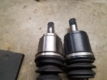 Duralast Gold on the left, Insane Shafts on the right.  Passenger side inboard CV joint.