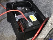 This is super hack for now. I am showing you my zits basically. Lol. I used a stereo amp fuse, 1AWG wire to 4AWG wire, electrical tape.. lol. Just needed to get it done so I had something to reinvent, and to be motivated and not in fear of unOEM’ing my shit. Drilled holes in my car. :( 