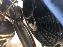 The 12” fan is mounted to the condenser and has plenty of clearance between it and the exhaust.