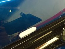 Access whole cut for tow strap