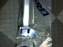 Also pick new in package, a front Greddy strut bar to replace the oem one