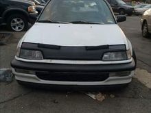 Added a VW lip and painted the front grill black. Looks so much better now.