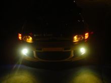 city lights and fog