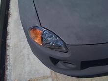 One piece black housing headlights