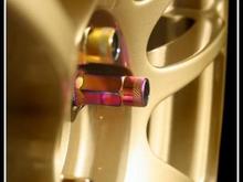 Advan RS gold wheels. with Muteki Neo Chrome Racing Lug Nuts
