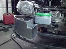 Intercooler reservoir and battery box