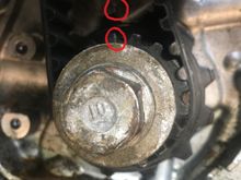 This is what I believe to be TDC without the crank pulley installed. I circled what I believe to be the marking on the crank gear and the mark on the oil pump