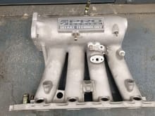 Theyre offering me this s2 manifold for my b16. Is it a real one or rep? thanks. 